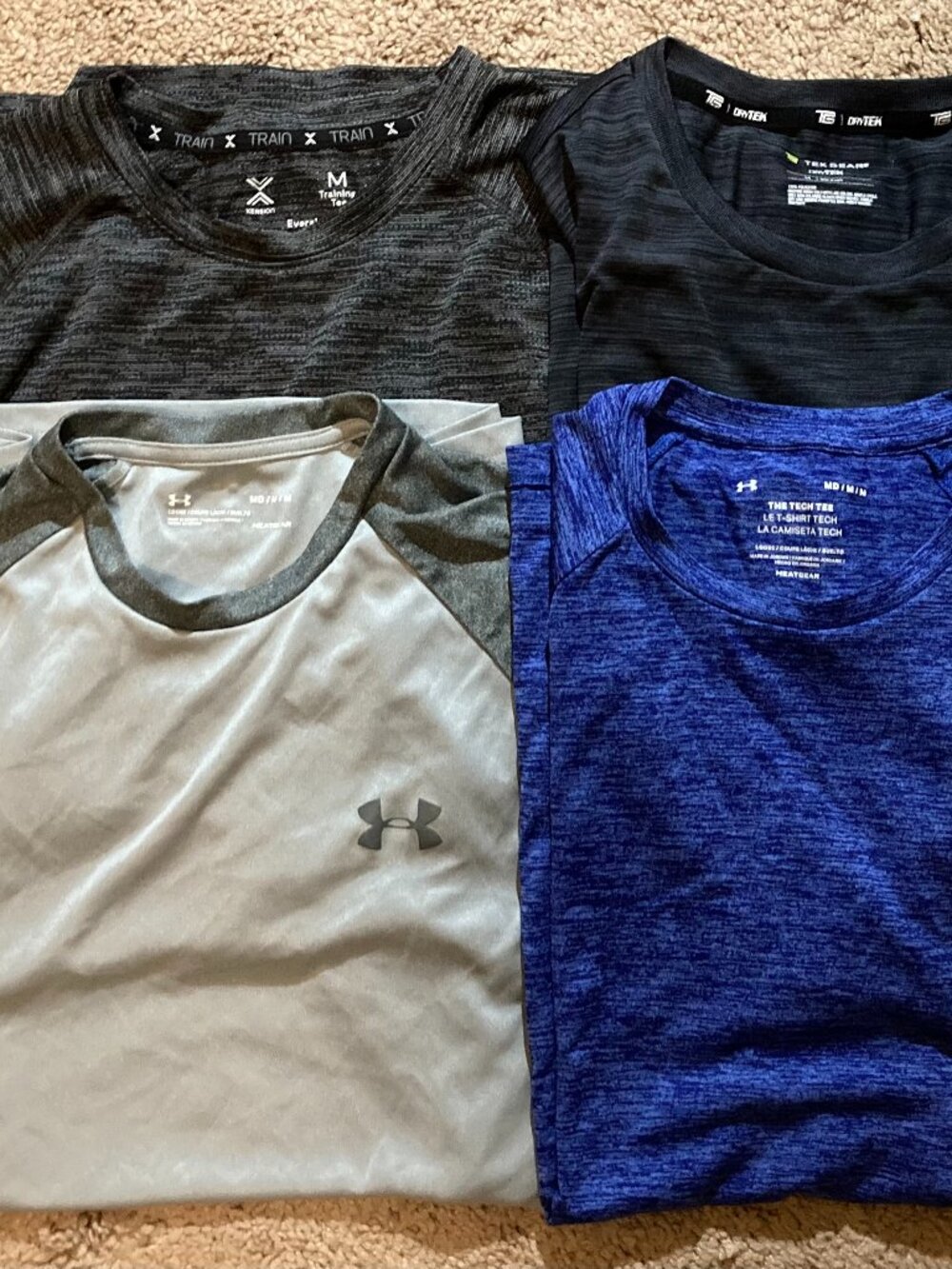 4 lot workout shirts, size Medium, NWOT - 2 Under Armour Heat Gear, Xersion, Tek